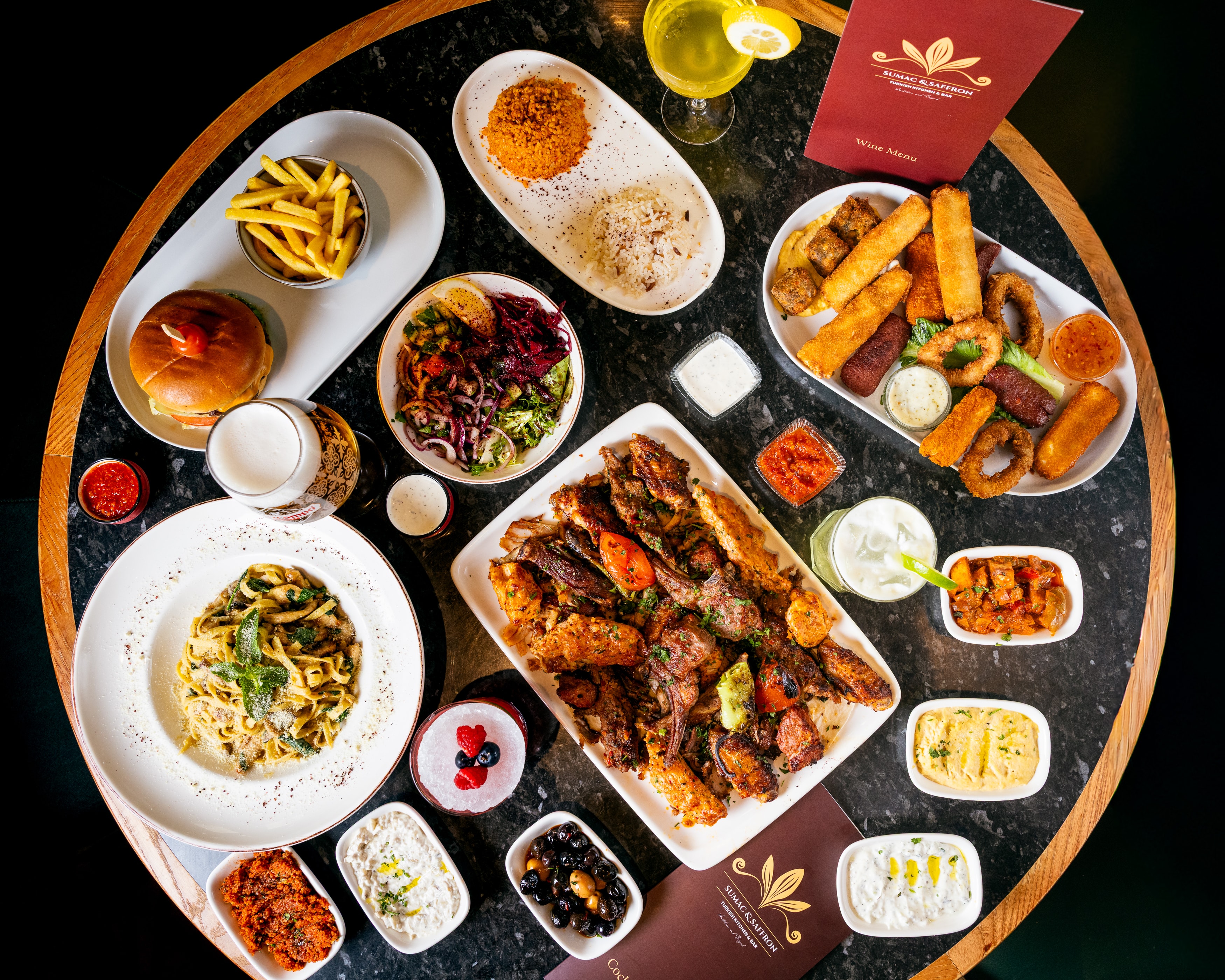 Family sharing Middle Eastern dishes at Saffron Sundays